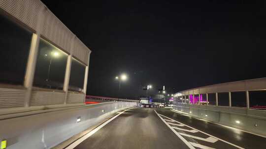 城市夜晚开车第一视角汽车窗外沿途风景马路视频素材模板下载