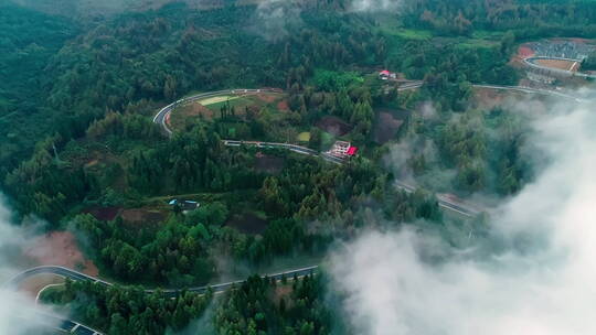 航拍云雾环绕的盘山公路4k素材