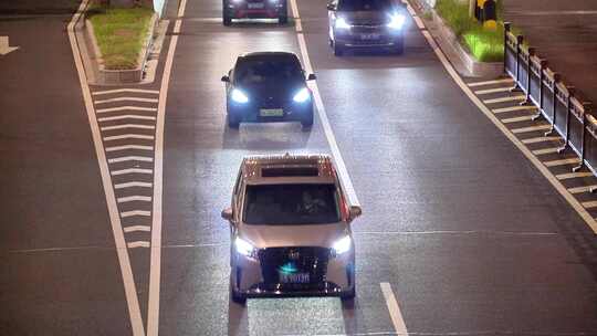 夜晚快速路隧道口车流马路行车亮化