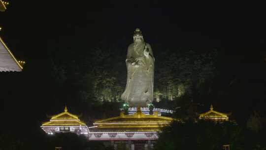 航拍4K夜晚河南老君山景区亮灯老子雕像