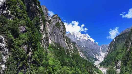 航拍四川甘孜磨西镇燕子沟爱德嘉峰雪山风光