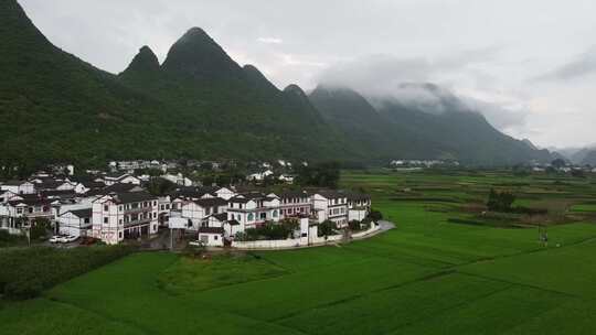 航拍贵州兴义万峰林布依族村落山水田园风光视频素材模板下载