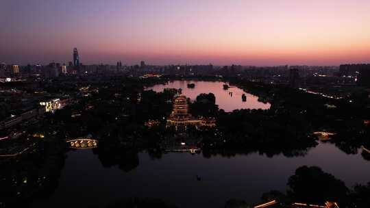 济南大明湖日落晚霞夕阳夜景灯光超然楼航拍