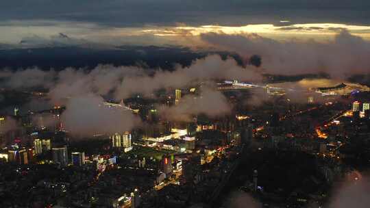 航拍宜昌雨后云雾缭绕的城市风景