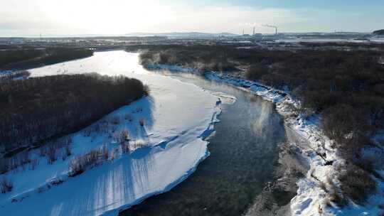 航拍呼伦贝尔河流湿地初春雪景