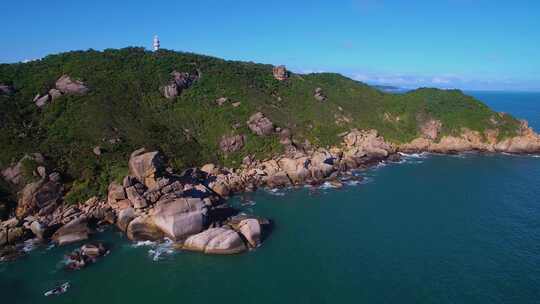 航拍海南三亚西岛海洋文化旅游区海浪礁石