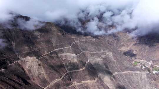 4k崎岖蜿蜒险峻的山路航拍视频素材模板下载