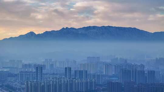 清晨庐山雪景下的九江城景航拍延时