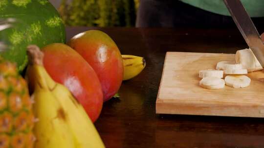 cutting-banana-for-a-fruit