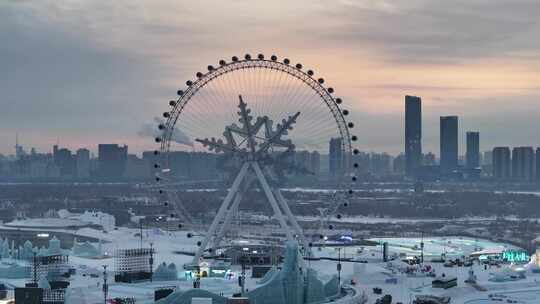 航拍哈尔滨冰雪大世界晚霞夕阳朝霞灯光夜景