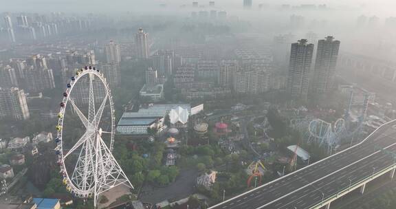 上海锦江乐园夏季日出平流雾航拍