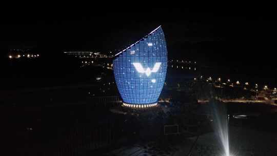 柳州会展中心夜景五菱宏光logo灯光视频素材模板下载