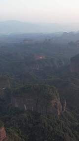 竖版航拍广东韶关丹霞山5A景区晚霞日落夕阳高清在线视频素材下载