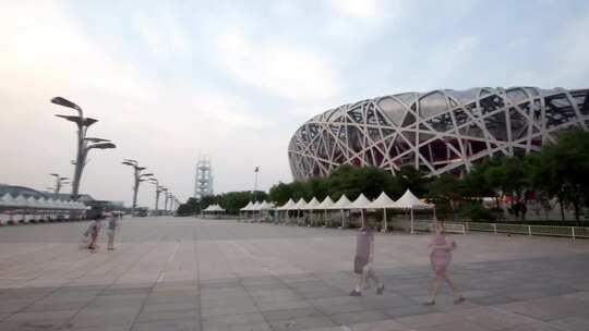 城市延时城市夜景画面航拍天空之城北京鸟巢视频素材模板下载