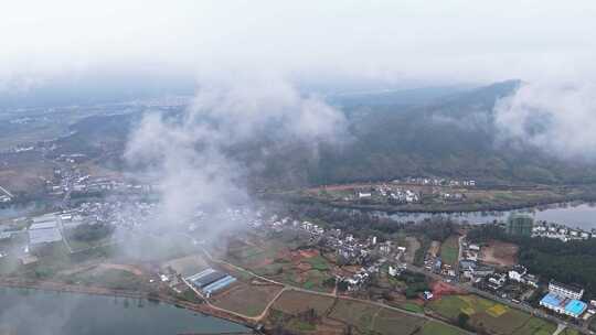 高空云层下的安徽皖南乡村景色