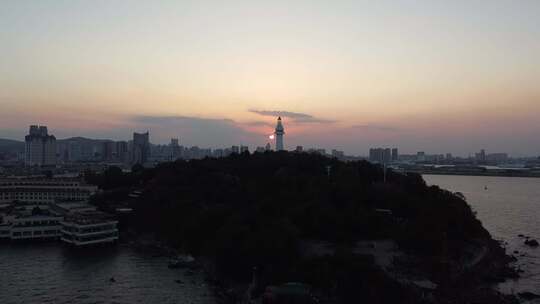 航拍山东烟台海岸线日出日落晚霞风景