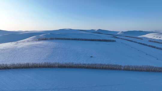 航拍寒冬内蒙古垦区雪原风光