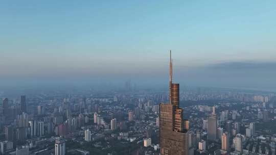 航拍中国江苏省南京市落日阳光下的紫峰大厦