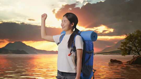 亚洲女性徒步旅行者在湖边庆祝成功的侧视图