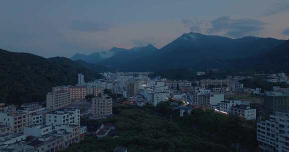 航拍广东信宜钱排镇夜幕降临蓝调时刻的夜景