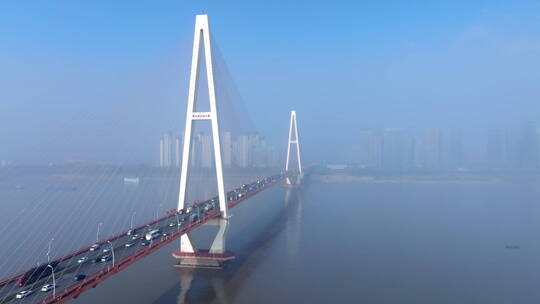 航拍云雾中的清晨武汉白沙洲大桥