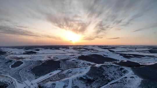 航拍丘陵山地雪景暮色