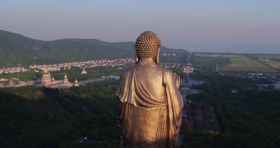 旅游景区 航拍灵山大佛俯览景区 晚霞 背影