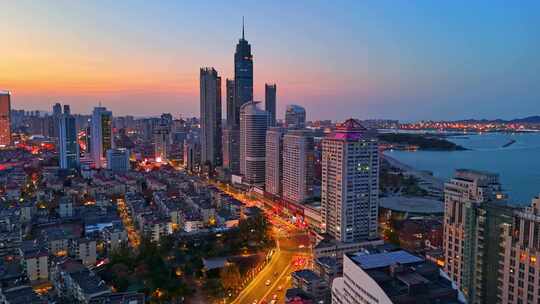 航拍山东烟台芝罘区城市晚霞蓝调夜景风光