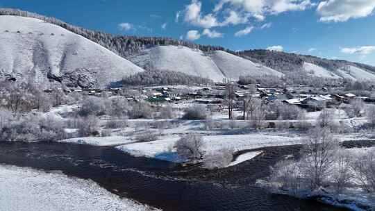 航拍早春雪后的山村银装素裹