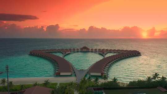 马尔代夫群岛海滩日落水上平房度假酒店印度视频素材模板下载
