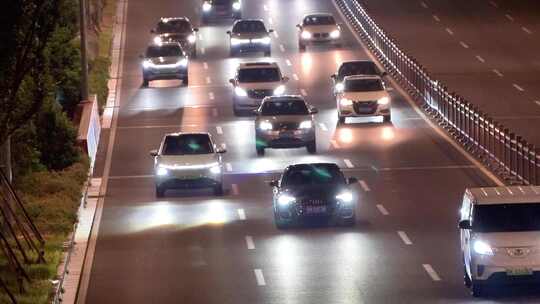 夜晚快速路隧道口车流马路行车亮化