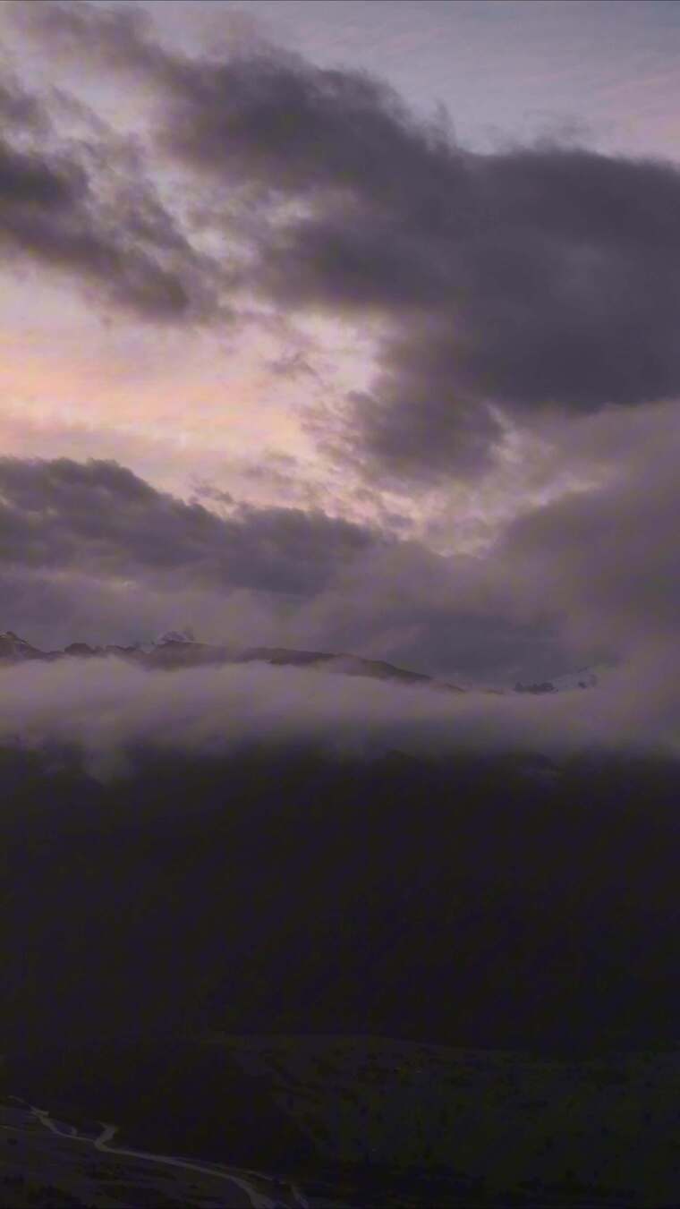 竖屏航拍新西兰福克斯冰川云海霞光