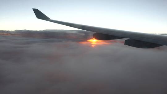飞机机翼舷窗云层高空云海夕阳飞行视频素材模板下载