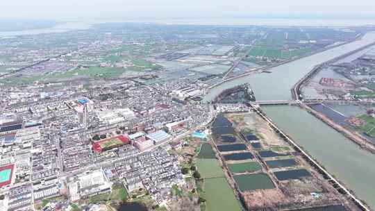 航拍农村乡镇农田建筑春景