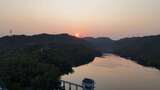 航拍水库夕阳青山绿水全景高清在线视频素材下载