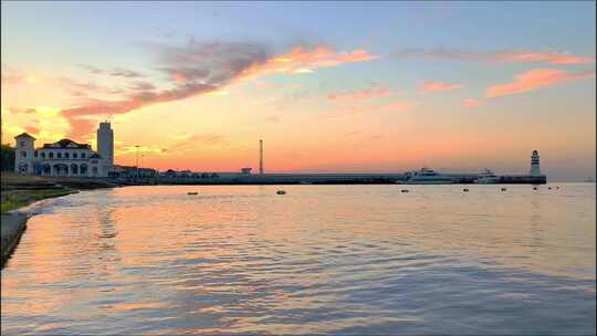 沿海城市海上日出朝霞延时