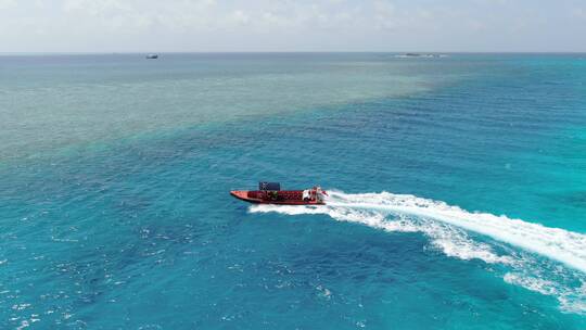西沙群岛南海岛礁小船航拍视频素材模板下载