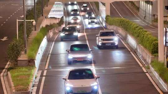 夜晚快速路隧道口车流马路行车亮化