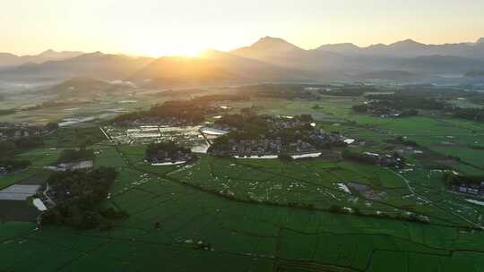 中国侨乡广东台山乡村稻田山脉山峰日出航拍