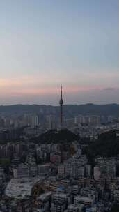 竖版航拍贵阳东山寺晚霞夜幕降临