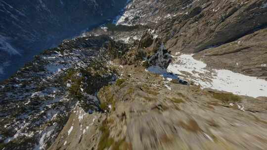 FPV无人机航拍高山白雪森林山脉峡谷蓝天云