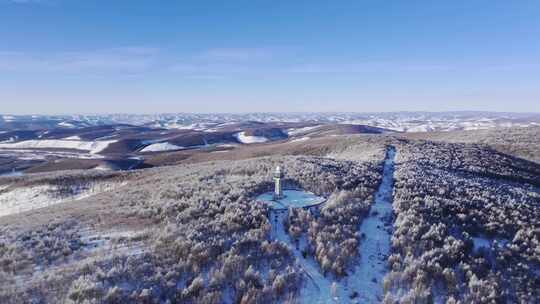 航拍冬季大雪后内蒙古阿尔山气象雷达气象站