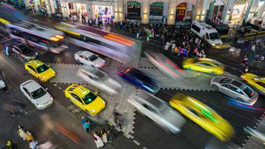 广州北京路十字路口繁忙交通和人群延时摄影