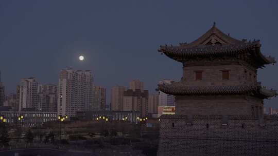 山西大同古建筑城楼与现代建筑夜景