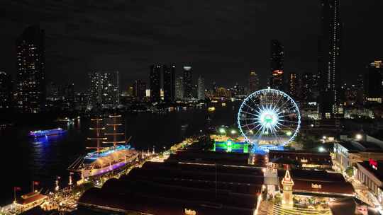 航拍泰国曼谷亚洲河滨夜市湄南河夜景风光视频素材模板下载