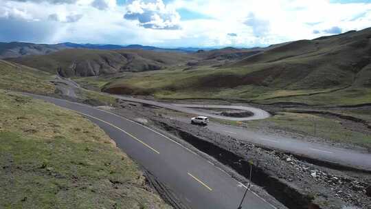 自驾西藏盘山公路航拍跟拍 S弯山路群山