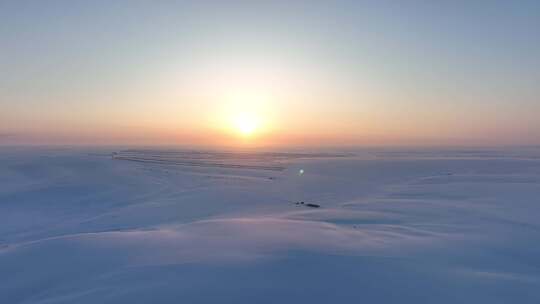 寒冬雪原田野夕阳自然风景