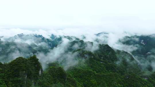 航拍大自然山林间的巍峨山峰俯瞰4k素材