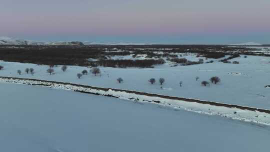 航拍大兴安岭冬季不冻河雪景视频素材模板下载