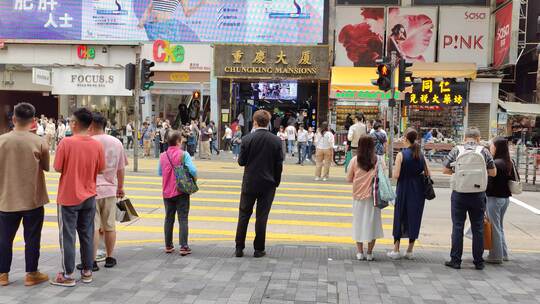 香港城市街道重庆大厦人来人往实拍4K视频素材模板下载